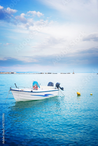Fishing boat floating in water of Zaante town, beautiful detail of Zakinthos island, Greece, retro toned © neirfy
