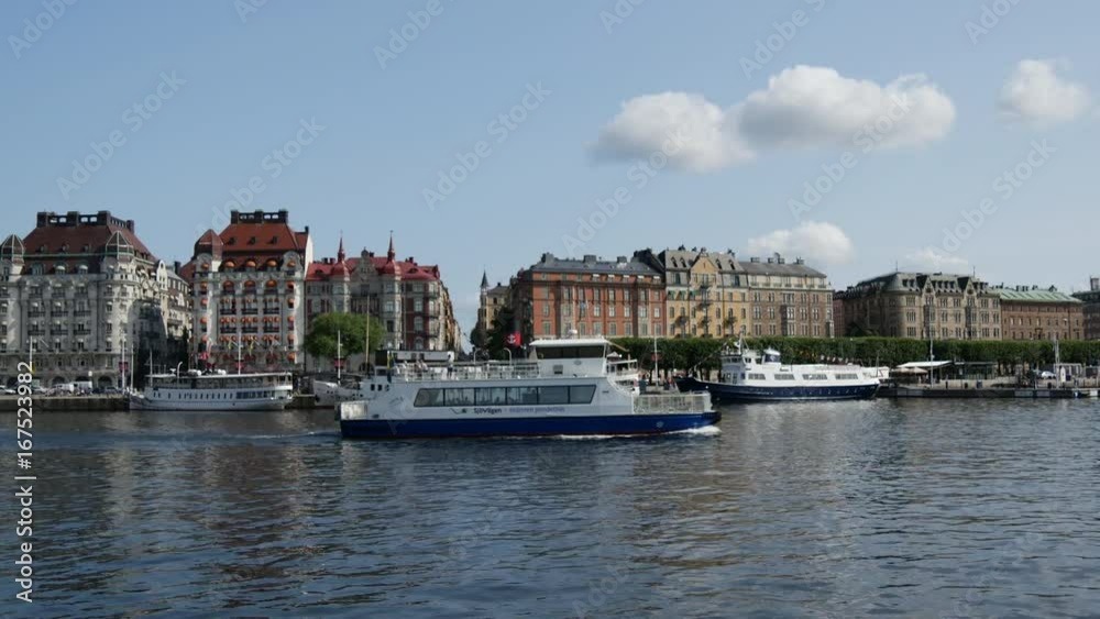 Classic builings in Ostermalm with cruise ship passing by in Stockholm Sweden Classic builings in Ostermalm with cruise ship passing by in Stockholm Sweden