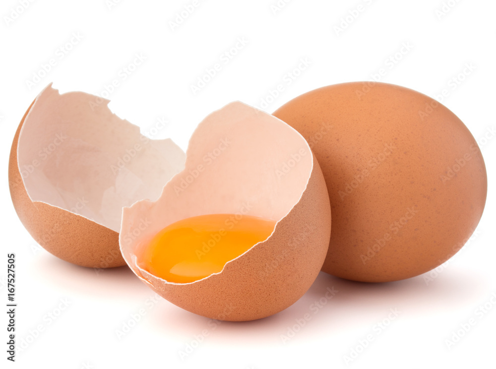Broken egg in eggshell half and raw egg isolated on white background cutout Broken egg in eggshell half and raw egg isolated on white background cutout