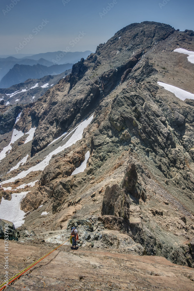 Alpine Rockclimber Rappels in the Cascade Mountains