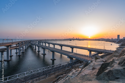 Dalian Cross-Sea Bridge at dusk.