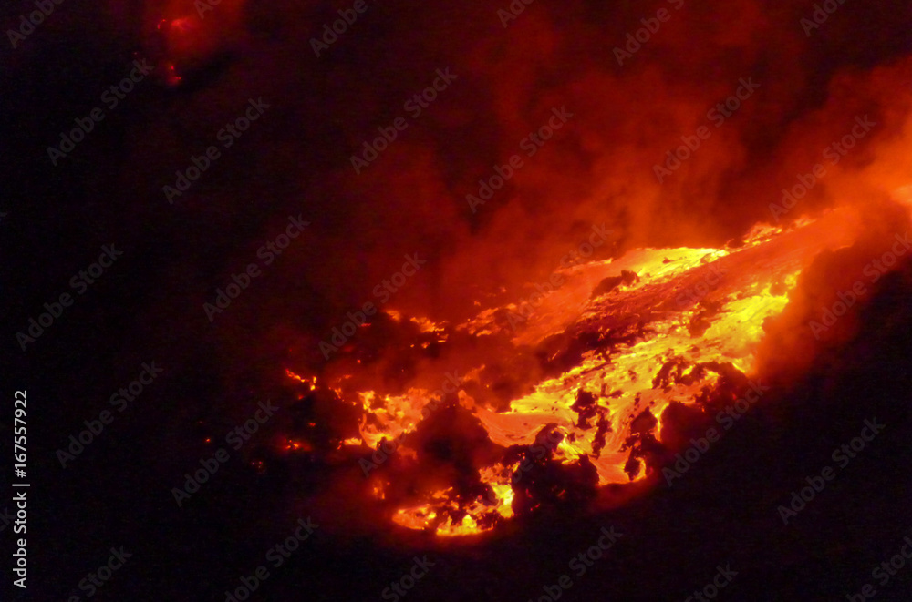 Lava flowing into the sea at night Lava flowing into the sea at night