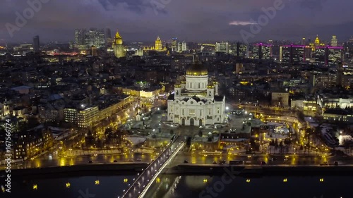 Night view of the Moscow city center, Kremlin and Cathedral of Christ the Saviour, aerial shot 4k
