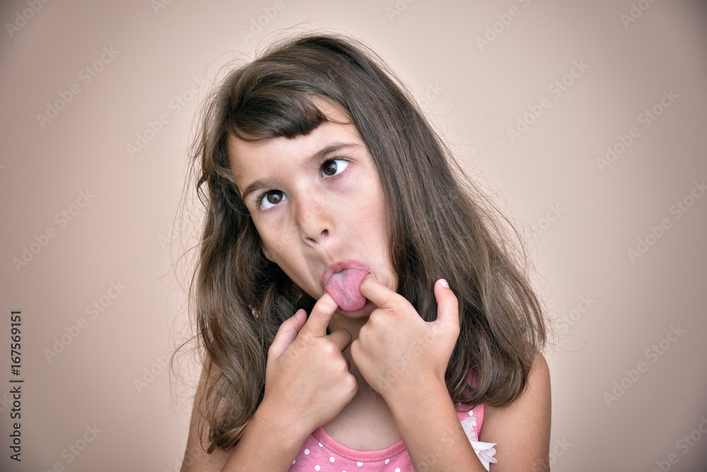 Young girl making a face Young girl making a face
