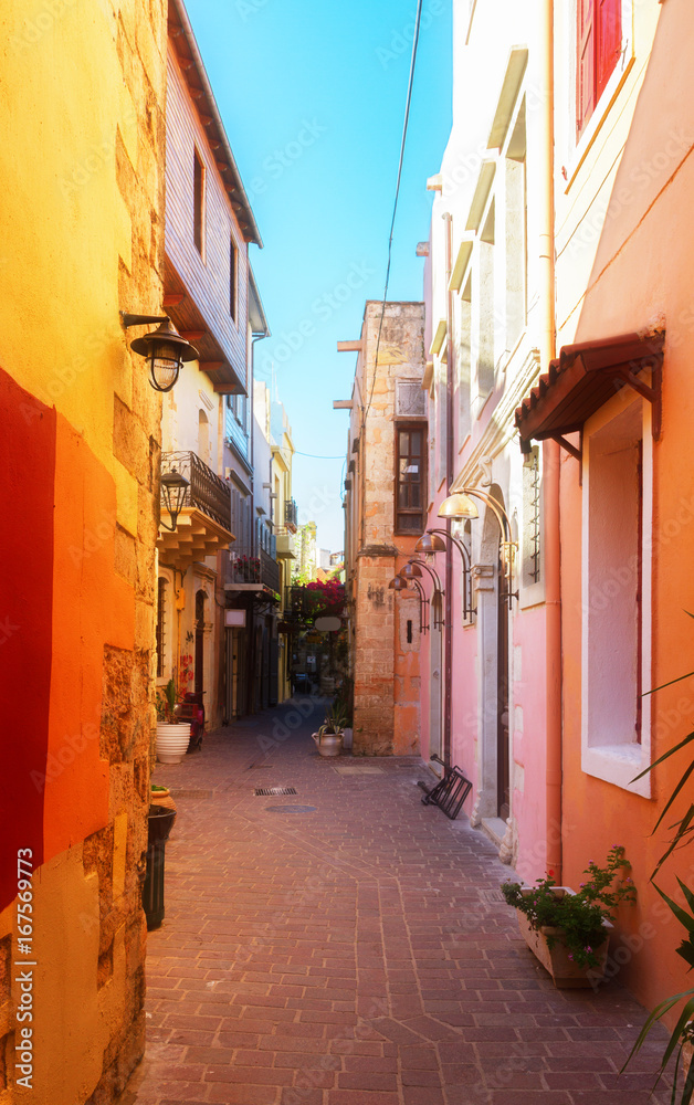 cosy street of Chania old town, Crete, Greece, retro toned
