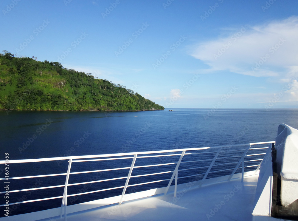 Fototapeta premium Scene of the crater of Garove Island from a cruise ship, Papua New Guinea.