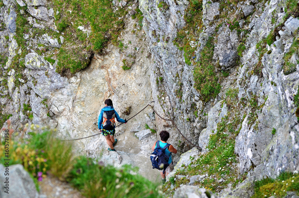 Tourists hiking in mountains - Slovakia, Hight Tatras