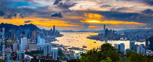 Victoria Harbor of Hong Kong at twilight photo