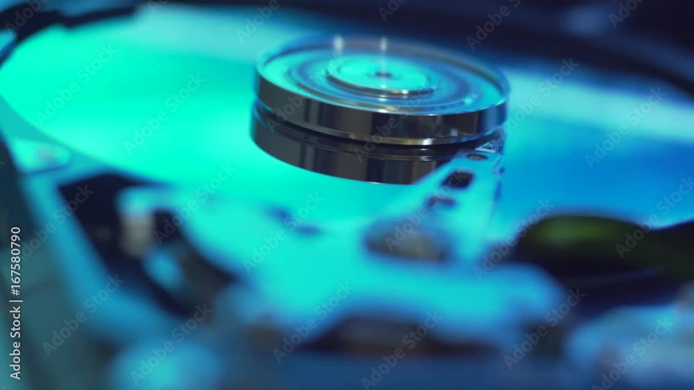 Hard Disk Drive, computer data storage, blue surface. Hard Disk Drive, computer data storage, blue surface.