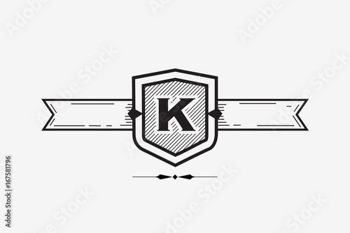Shield with ribbon, ornament engraving design element or company logo with letter K