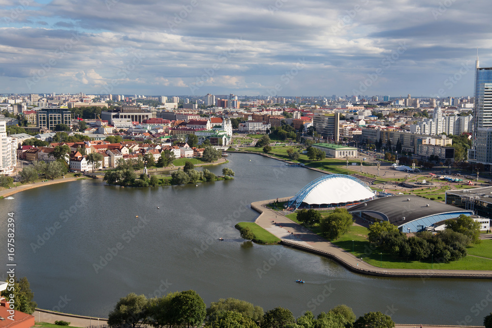 Aerial view of the south part of the Minsk with Trinity Hill, Liberty Square, Palace of Sport and Svislach River. Minsk is the capital and largest city of Belarus.