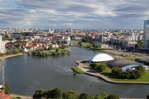 Aerial view of the south part of the Minsk with Trinity Hill, Liberty Square, Palace of Sport and Svislach River. Minsk is the capital and largest city of Belarus.