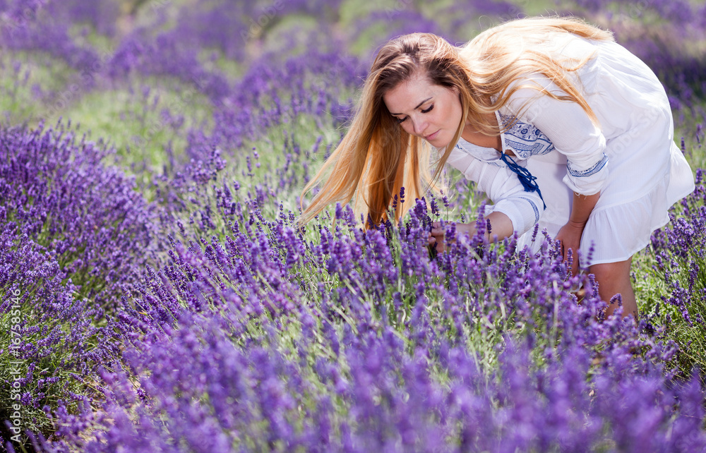 Lovely cute woman in lavender field at sunny day freedom concept Lovely cute woman in lavender field at sunny day freedom concept