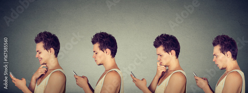 Young man expressing different emotions using his mobile phone