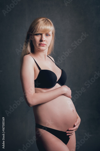 Picture of beautiful nude pregnant woman. © romaset