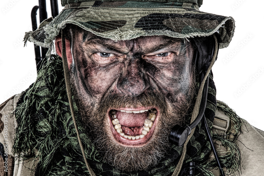 United States Commando face studio shot. Mouth opened, soldier yelling