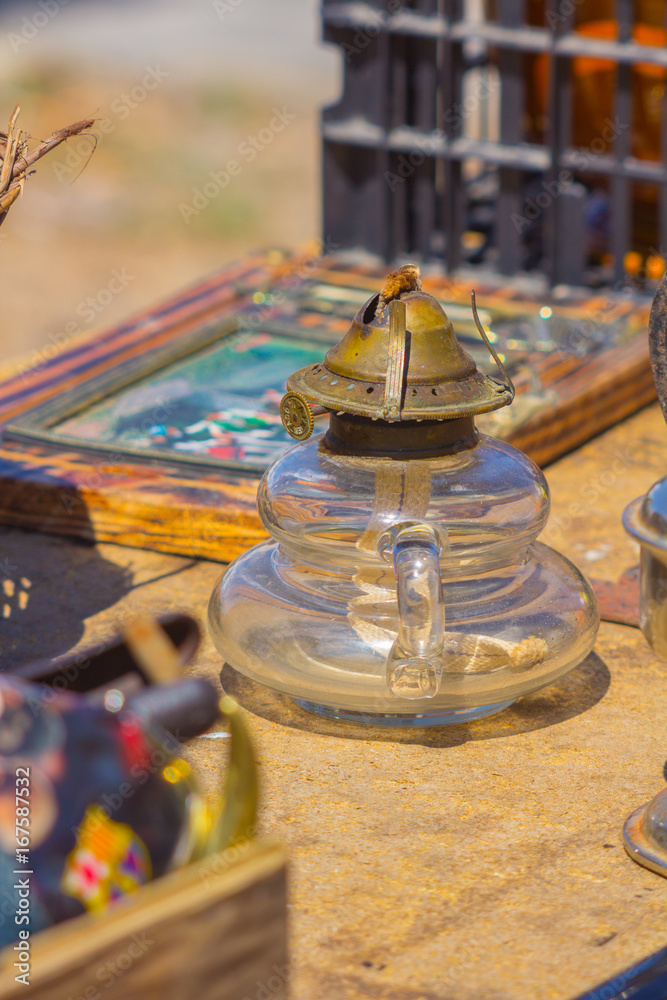 small and old glass oil lamp