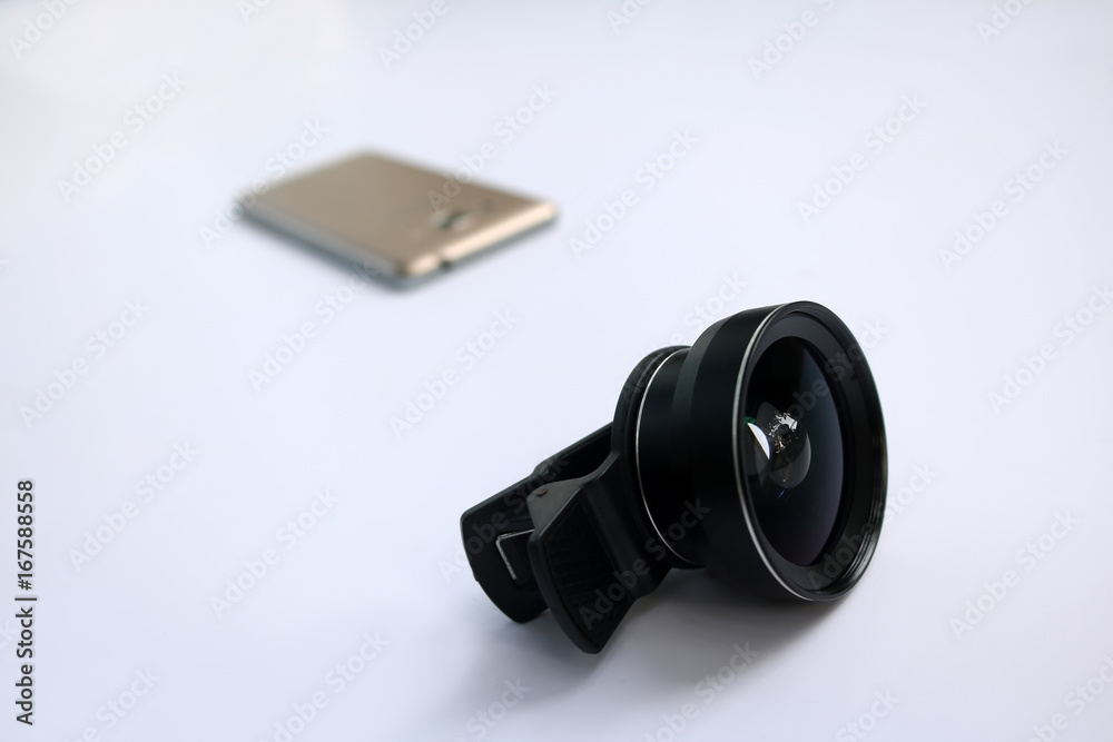 Clip lens with mobile phones in white background. Clip lens with mobile phones in white background.