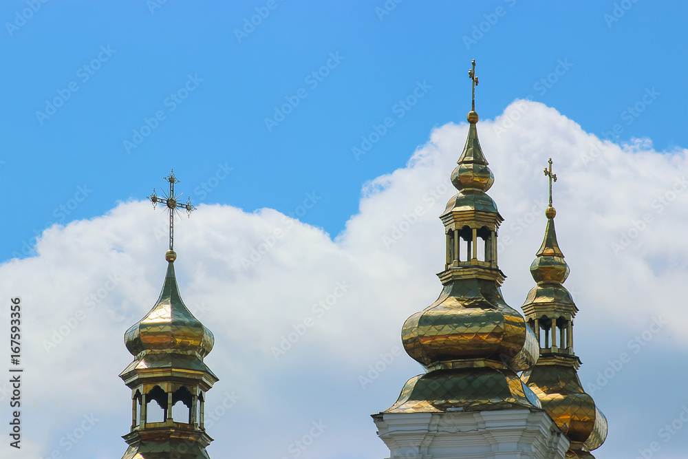 Golden cross on the church roof