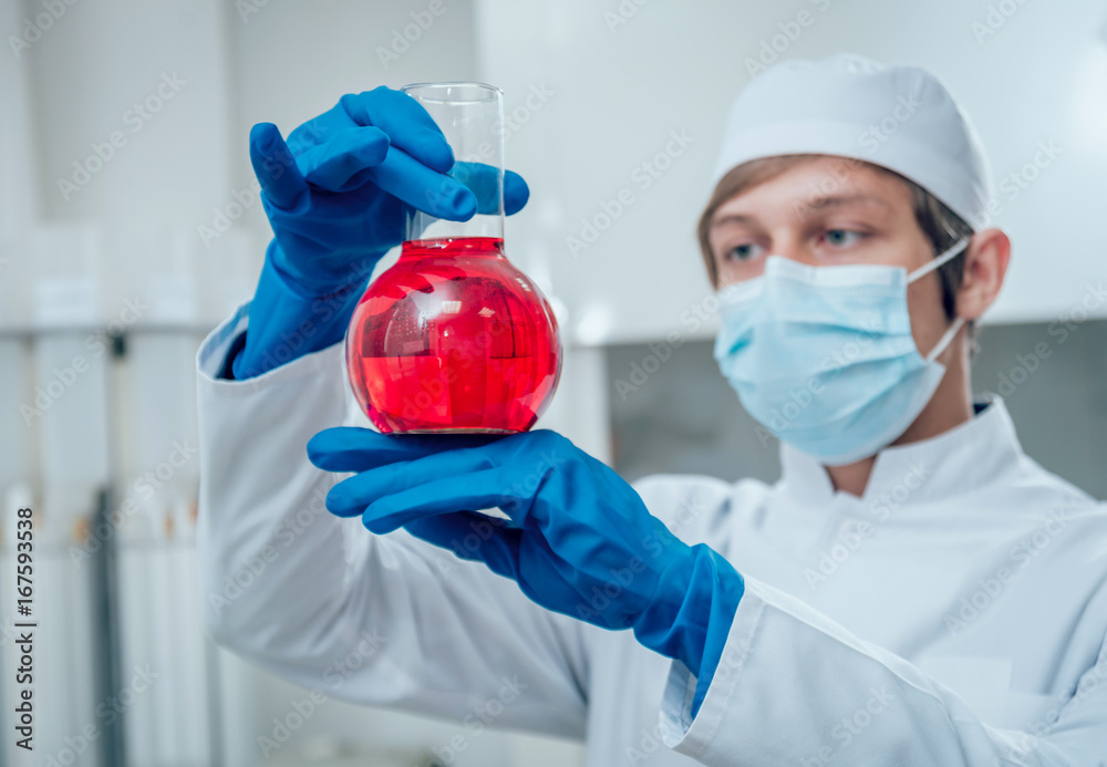 Science technician at work in the laboratory. Science technician at work in the laboratory.