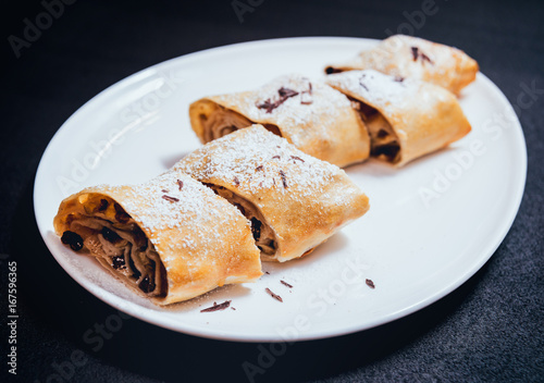 Homemade apple pies decorated with chocolate