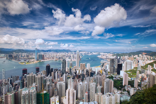 Top view of Hong Kong city, sea, kowloon city and Hongkong harbor from Victoria peak, Hong kong, China photo