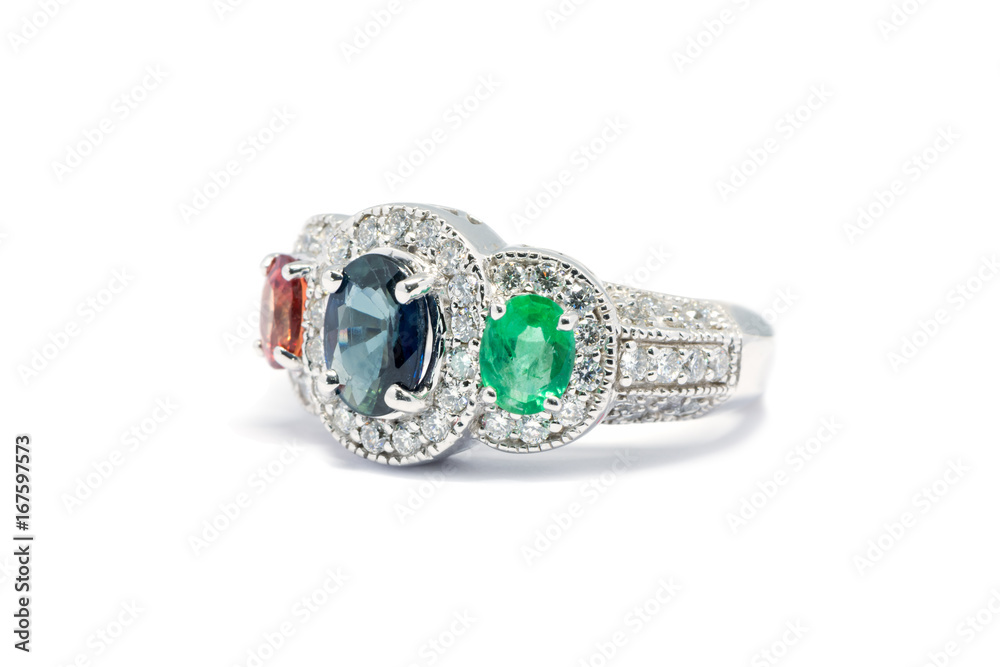Closed up Emerald, Blue Sapphire and Pink Diamond with white diamond and Platinum ring