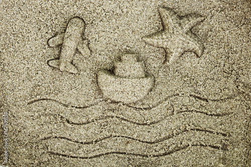 Beach toy prints on the sand. Flat lay. Advertising holiday summer card concept