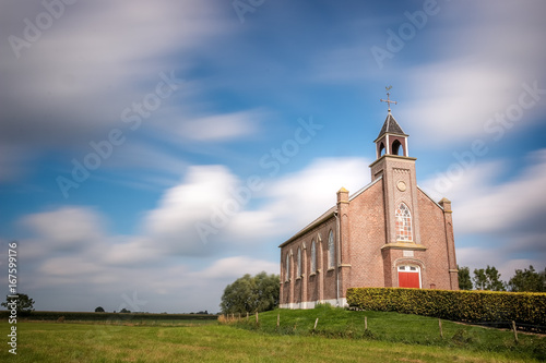 Little church on a green hill