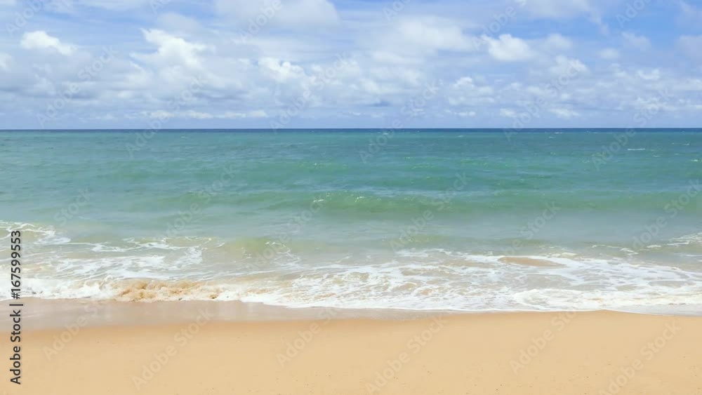 Beautiful sea waves with the sky. Bright clouds at Karon Beach Phuket Thailand Beautiful sea waves with the sky. Bright clouds at Karon Beach Phuket Thailand