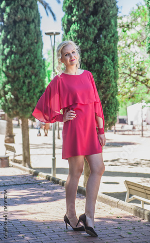 Beautiful woman in pink dress