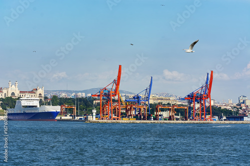 Cranes and freight vessel in Haydarpasa port.Istanbul , TURKEY photo