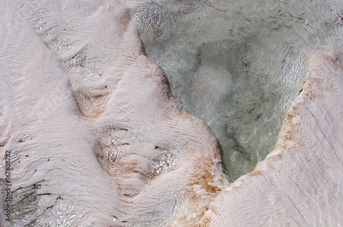 Whimsical figures are formed by flows of highly mineralized water in the salt pools of Pamukkale, Turkey