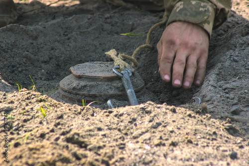 Anti-tank mine installing