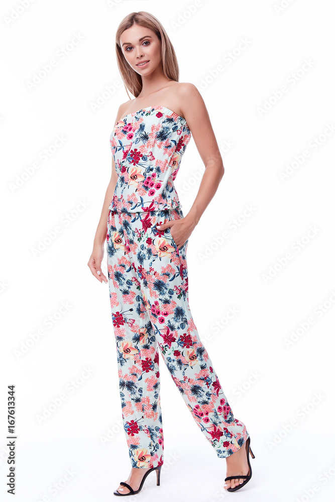 Sexy blond woman wear overalls colorful cotton suit casual style for walk travel white background catalog of fashion clothes pretty lady summer collection body shape beautiful face cosmetic organic. Sexy blond woman wear overalls colorful cotton suit casual style for walk travel white background catalog of fashion clothes pretty lady summer collection body shape beautiful face cosmetic organic.