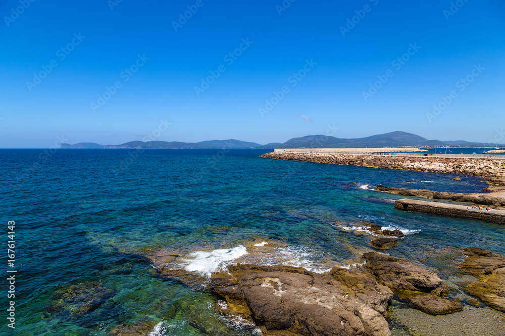 Alghero, Sardinia, Italy. Picturesque shore and port dike