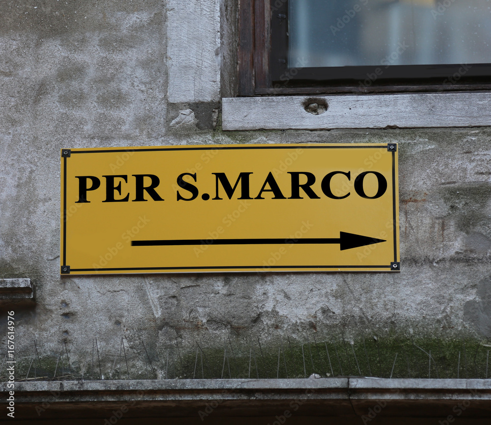 road sign with directions to get to Square San Marco in Venice,