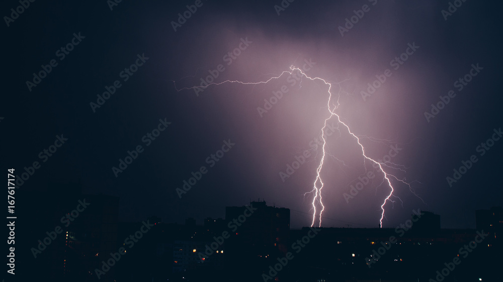 Naklejka premium Incredible huge lightning above the city