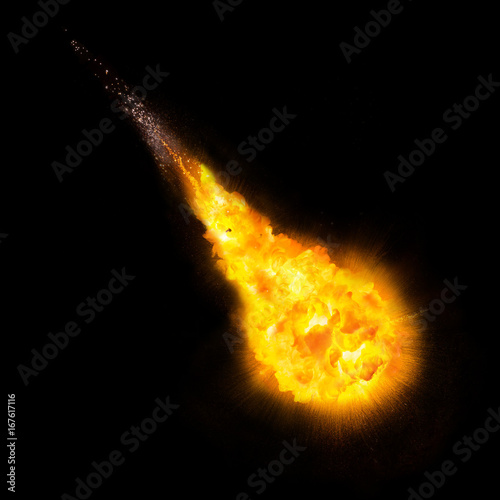 Realistic fireball over a black background photo