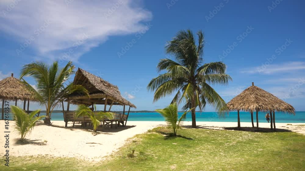 Beach with white sand with beach house on a tropical island Daco. Beautiful sky, sea, resort. Seascape: Ocean and beautiful beach paradise. Philippines. 4K video. Travel concept. Beach with white sand with beach house on a tropical island Daco. Beautiful sky, sea, resort. Seascape: Ocean and beautiful beach paradise. Philippines. 4K video. Travel concept.