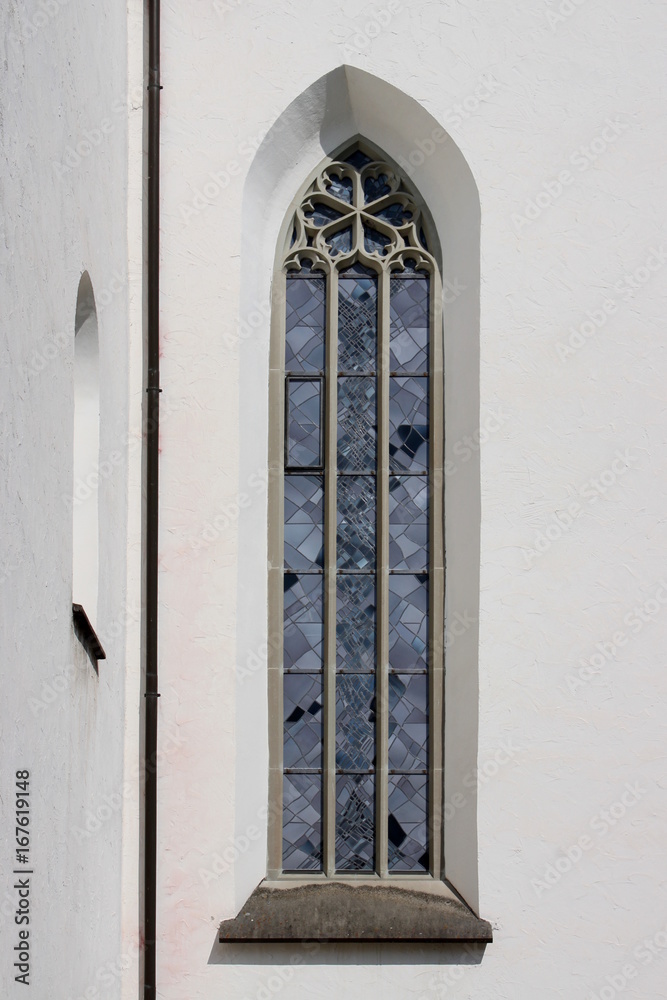 Fenster an der Kirche St. Martin in Leutkirch im Allgäu Fenster an der Kirche St. Martin in Leutkirch im Allgäu