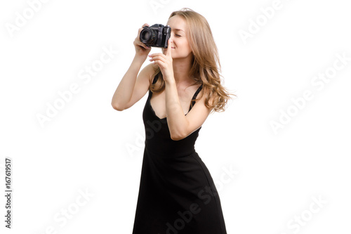 Young woman with an old camera