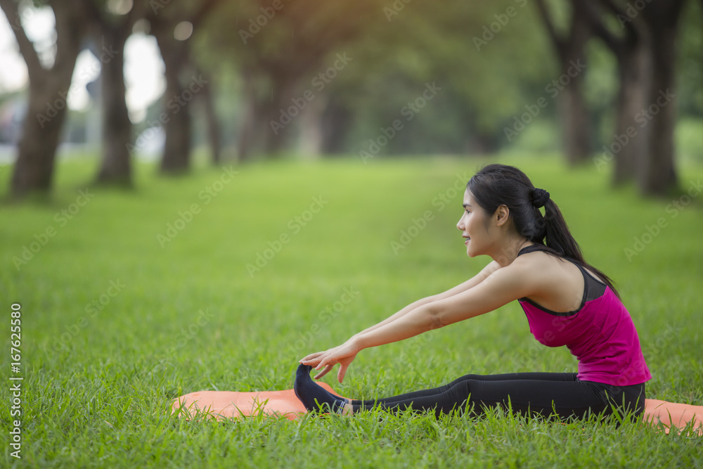 Women exercising.Women exercising in sunny bright light.