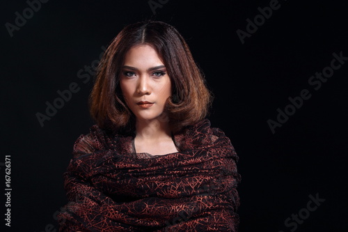 Asian Woman Fashion Make Up brunette hair, studio lighting black background