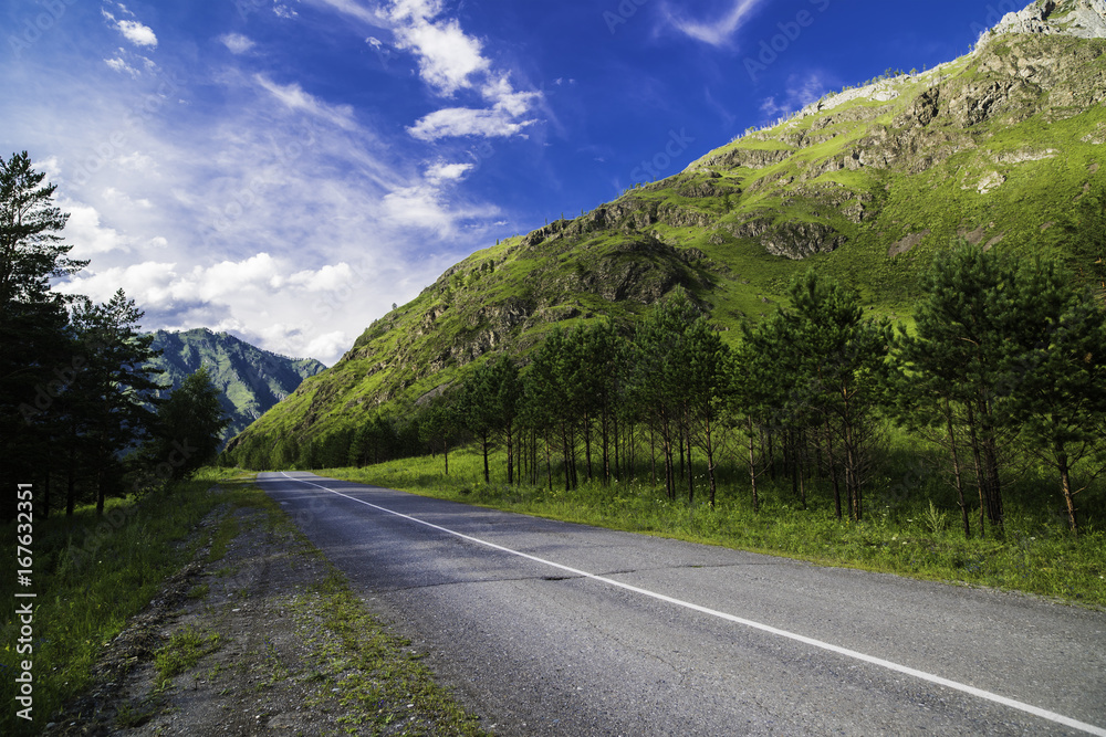 Asphalt road in the mountains of Altai