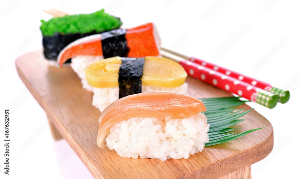 Japanese Cuisine - Sushi Roll on a white background Japanese Cuisine - Sushi Roll on a white background