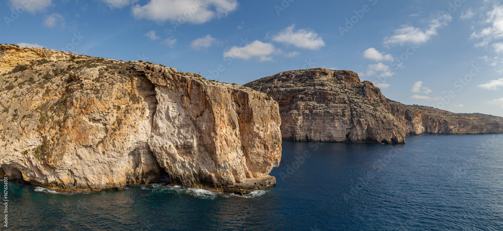 Blue Grotto limestone cliff, majestic nature landmark of Malta island