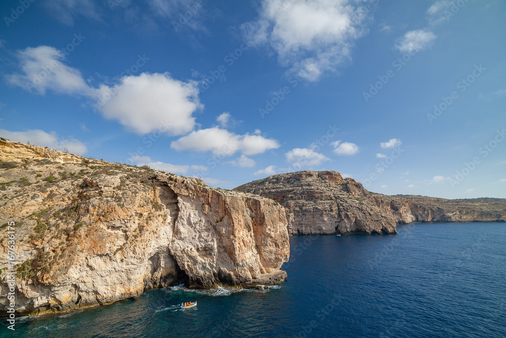 Blue Grotto limestone cliff, majestic nature landmark of Malta island