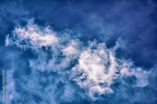 Blue sky with white clouds closeup