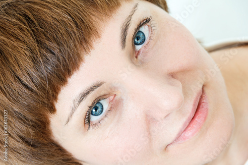 Portrait of woman with blue eyea photo